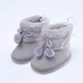 Weiche graue Baby-Winterstiefel mit Kunstpelzkragen und süßen dekorativen Bommeln - Grau