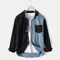 Close-up of a men's color-block corduroy shirt with unique black and blue paneling - Blue