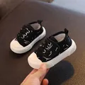 Toddler black canvas walking shoes with white doodle pattern and non-slip rubber sole. - Size 17 (Inner 12.5cm) / Black