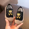 Cute black baby canvas shoes featuring a cartoon bear ornament and soft anti-slip rubber sole - Inner Length 12.5cm/Size 17 / Cartoon Bear Style / Black
