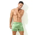 Front view of men's green satin home shorts on model, soft luster fabric, loose fit style - Grass Green