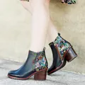 Detail shot of vintage leather ankle boots with floral patchwork and chunky heel - 36 / Dark Blue