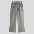 Pantaloni casual da uomo vestibilità ampia in tinta unita verde salvia appesi - Taglia S / Pantaloni e gonne / Verde chiaro