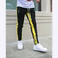 Men's black jogger pants with yellow side stripes and ankle zippers for casual sports. - M / Bottoms / Black Yellow