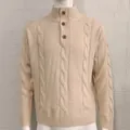 Detailed view of a classic beige cable-knit men's sweater with a half-button mock neck - M / Tops / Off White