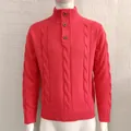 Close-up detail of a red men's cable knit sweater with a high neck and three buttons - M / Tops / Watermelon red