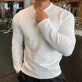 Macro view of white textured knit long-sleeve sweater for men showcasing fabric detail - M / Tops / White