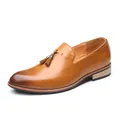 Elegant tan leather loafers for men with decorative tassels and slip-on design - Yellow