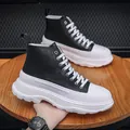 Stylish men's black high-top boots with thick white soles and fashion sports logo - 38 / Black and White Patchwork