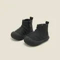 Black quilted toddler snow boots featuring side zipper and durable non-slip rubber sole - Black