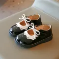 Elegantes zapatos Mary Jane para niña en blanco y negro con encaje y un lazo blanco - Negro