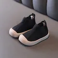 Black boys mid-top canvas shoes with warm lining, anti-slip toddler walking boots. - Black