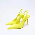 Side view of vibrant yellow pointed-toe slingback high heels with slender stiletto heels. - 35 / Yellow