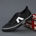Shanbu black canvas sneaker for men with white side patch and durable vulcanized sole - All Black