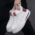 Modern white men's casual sneakers featuring soft air cushion sole and colorful accents. - AB White