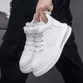 Men's stylish white casual sneakers with air cushion soft sole and leather upper. - White