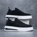 Modern black breathable fly-knit men's sock shoes featuring white thick air cushion soles - 41 / Black