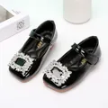 Élégantes babies en cuir verni noir pour filles avec une grande boucle carrée en strass - Noir