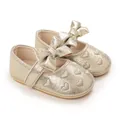 Detailansicht der goldenen Kleinkind-Prinzessin-Schuhe mit Schleife und Stickerei - Gold