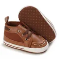 Close-up detail of brown soft sole baby walking shoes featuring anti-slip dotted bottom - Inner Length 12cm / Brown