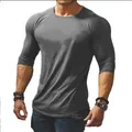 Detailed view of the slim fit grey round neck sports t-shirt showing fabric texture - S / Tops / Gray