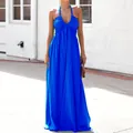 Detailed visual of a vibrant royal blue V-neck halter maxi dress worn by a model - S / Dresses / Blue