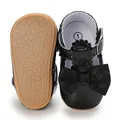 Black patent leather baby princess shoes with bow detail and textured soft sole - Black