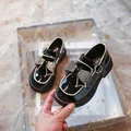Zapatos de charol negro para niñas con lazo de pedrería - Negro