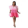 Detailed view of pink color-block satin tiered dress with puff sleeves and V-neck line. - S / Splicing Style / Pink