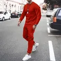 Detail view of men's red long-sleeve casual sports suit in outdoor street setting - S / Top And Bottom / Red