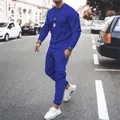Full-body street view of a men's casual royal blue tracksuit with joggers and sweatshirt - Sapphire Blue