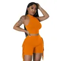Detail view of women's vibrant orange sleeveless crop top and matching fringe shorts set - Orange