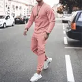 Full view of men's dusty rose casual tracksuit featuring a crew neck sweatshirt and joggers - S / Top And Bottom / Pink