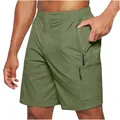 Detail of olive green cargo shorts with secure zipper pockets and elastic waist - S / Bottoms / Green