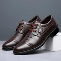 Detail view of brown men's business casual leather shoes with textured lace-up design - 38 / Lace-up (618) / Brown