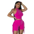 Vibrant pink sleeveless two-piece outfit featuring trendy fringe details on the shorts - Rose Red