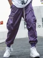 Men's purple oversized cargo pants with multiple pockets and cuffed hems - M / Bottoms / Purple