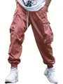 Lockere terracotta Cargo-Jogginghose für Herren mit mehreren Taschen und Kordelzug - Koralle