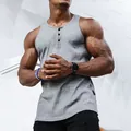 Close-up of gray ribbed Henley tank top highlighting texture and fit on male model - M / Tops / Gray