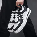 Modern men's black and white sneakers featuring air cushion soles and star motif - Black