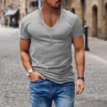 Close-up of a men's gray V-neck T-shirt showing the fit and fabric texture on a model - Light Gray