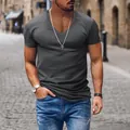 Close-up of a grey V-neck men's short-sleeve T-shirt with a casual fit in street - Dark Gray