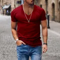 Detail view of a men's dark red V-neck T-shirt with high-quality fabric texture. - Burgundy