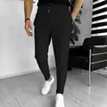 Stijlvolle zwarte heren vrijetijdsbroek van wafelbreisel met elastische trekkoord taille - Zwart