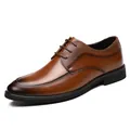 Braune Herren-Business-Schuhe aus Leder mit Schnürung und strukturierten Details. - 37 / All-season Tawny