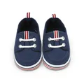 Bovenaanzicht van marineblauwe baby-loopschoenen van canvas met gestreepte details - Blauw