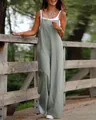 Detailed macro view of the sage green sleeveless wide leg jumpsuit on a wooden bridge - S / Set / Green Gray
