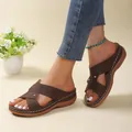 Casual women's brown wedge sandals featuring perforated crisscross straps and platform sole - 35 / Coffee