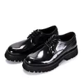 Close-up view of black patent leather men's brogue shoes with thick lug platform soles - 38 / Black