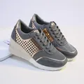 Detailed view of grey glitter platform sneakers with rose gold metallic accents - 35 / Gray